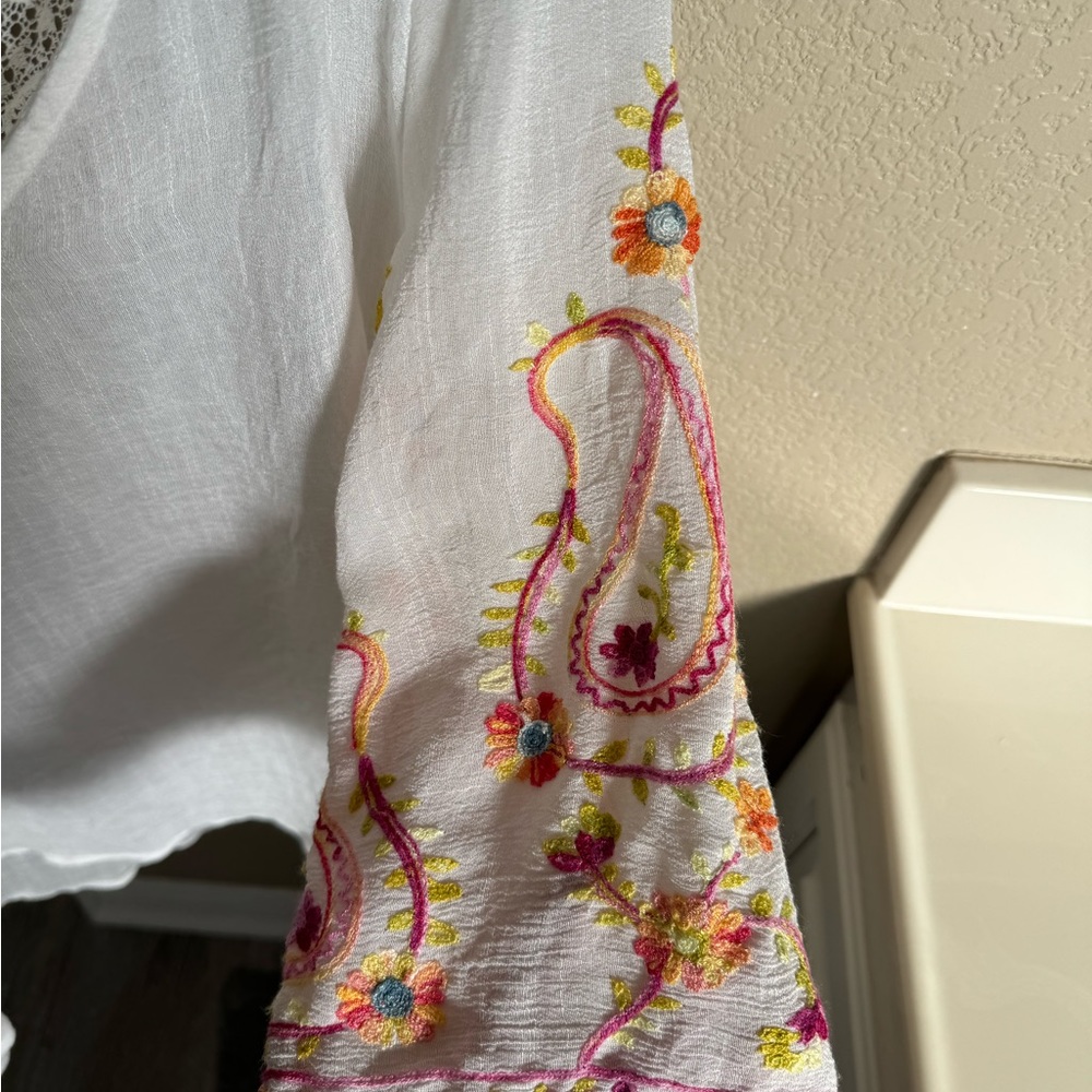 White boutique embroidered top